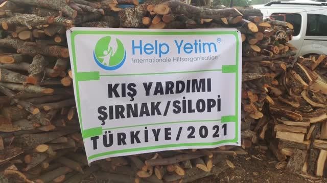 Gurbetçilerden Şırnak’ta odun yardımı